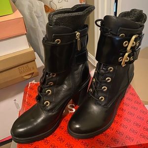 Brand New Guess boots. Size 8. Comes with box.